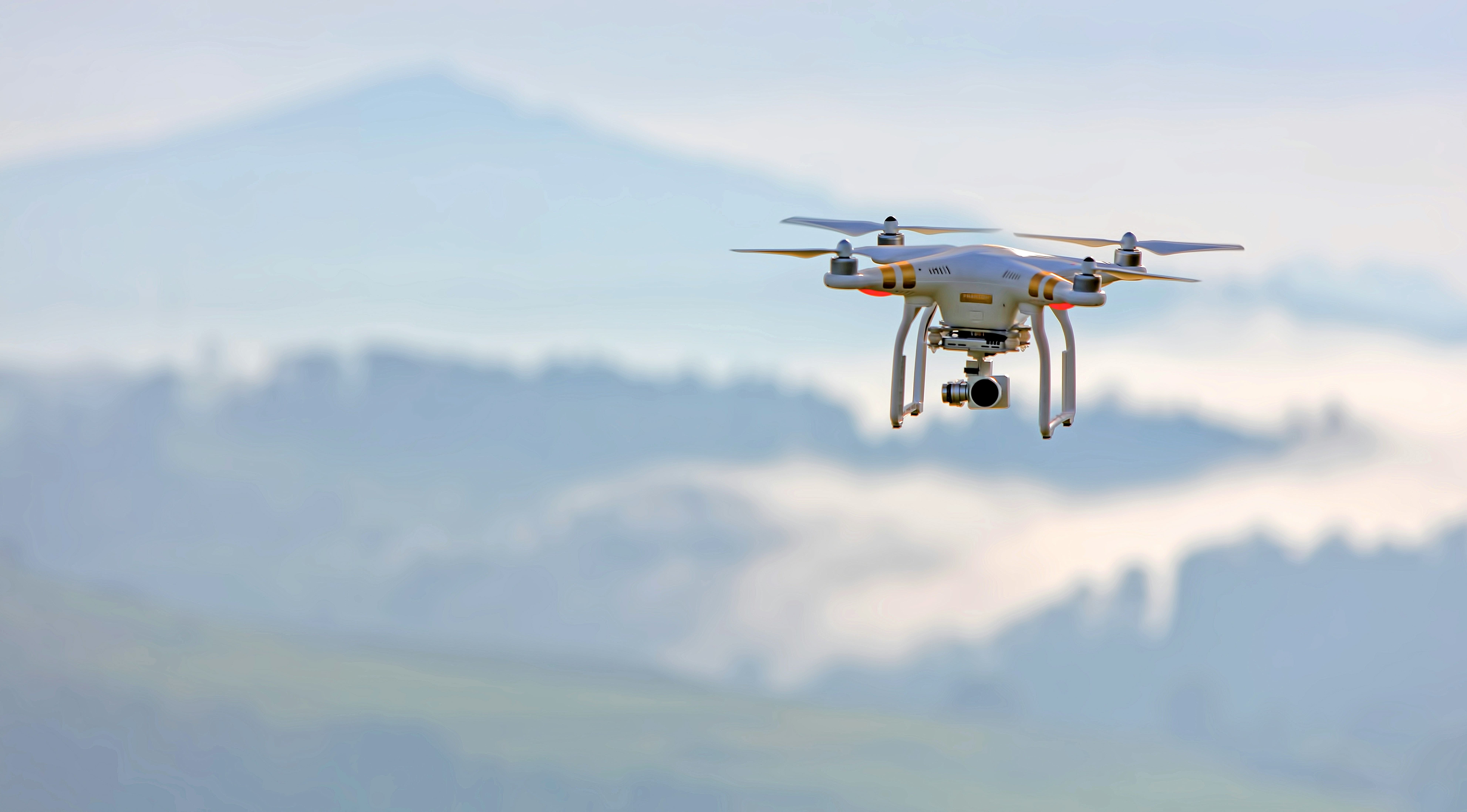 Drone flying at sunset